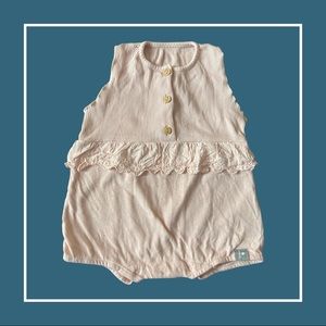Powder Pink Ribbed Ruffle Onesie—6m